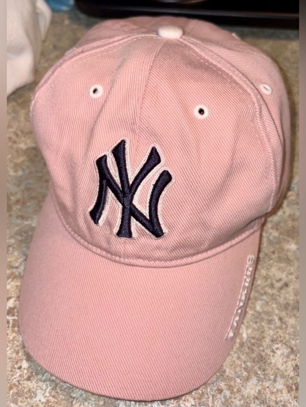 New York Yankees Pink Adjustable Baseball Hat. Navy Logo Genuine MLB Merchandise